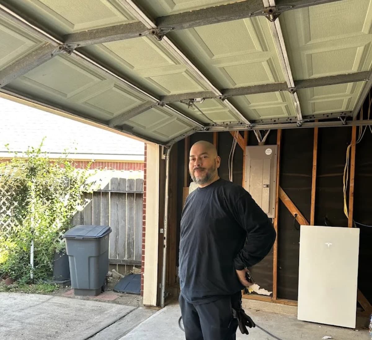 Cesar standing in front of a finished install